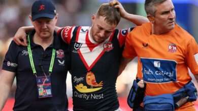 Roosters' title hopes look bleak as Walker suffers ACL problem, Smith limps off field after hip-drop