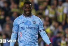 Mario Balotelli smiling during the Turkish Super League match between his side Adana Demirspor and Fenerbahce.