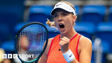 Katie Boulter reacts during a match.