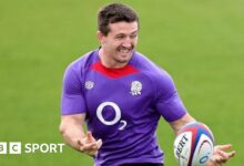 Tom Curry running with the ball in England training