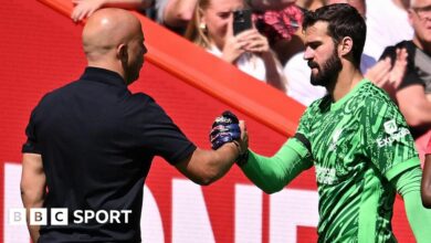 Liverpool manager Arne Slot with Alisson Becker