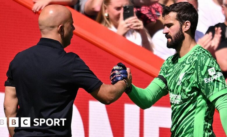 Liverpool manager Arne Slot with Alisson Becker