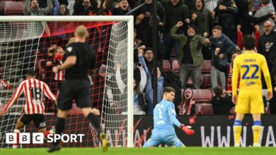 Illan Meslier looks at the ground after Sunderland's 97th-minute equaliser