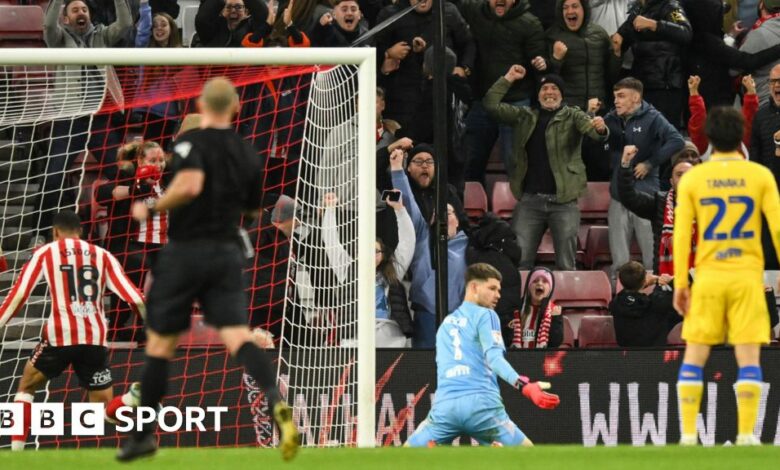 Illan Meslier looks at the ground after Sunderland's 97th-minute equaliser