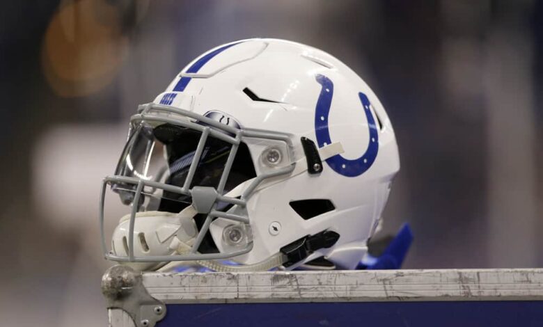 A Indianapolis Colts helmet sits on top of a equipment locker during the NFL game between the Miami Dolphins and Indianapolis Colts on November 25, 2018, at Lucas Oil Stadium in Indianapolis, IN.